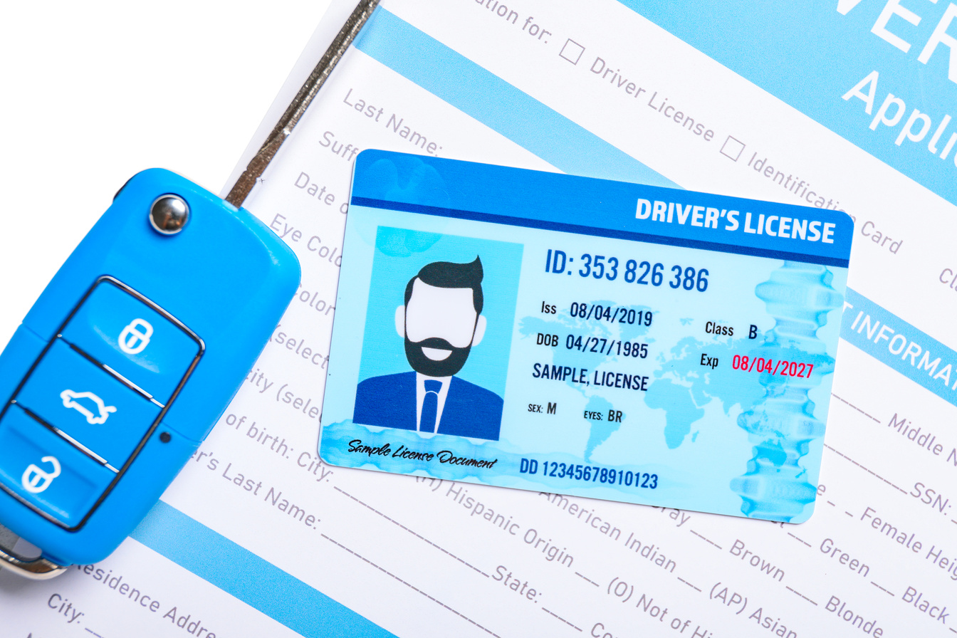 Driving License with Application Form and Car Key, Closeup